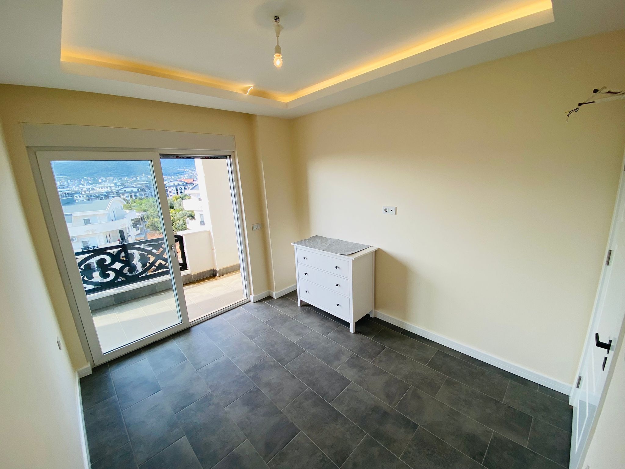 Image of Spacious 2+1 apartment in Oba district, Alanya, partially furnished